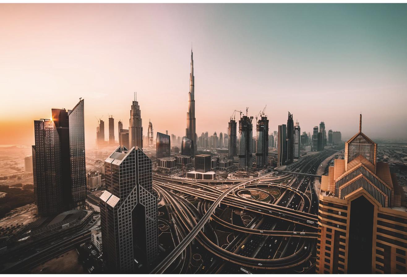 Downtown Dubai skyline at sunrise with Burj Khalifa, illustrating the real estate market where tokenized property investment is emerging